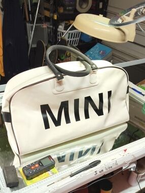 White MINI Cooper duffle bag W/ distinctive patent finish  bold black Letters